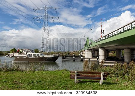 Steel Bridge Over River Vecht Near Amsterdam With Passing Yacht