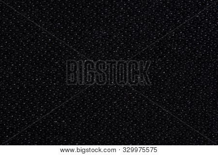 Abstract Background. Black Kevlar Fabric Close-up. Macro Photography