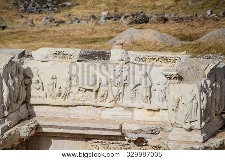 Bas-reliefs Of Antique Scenes On The Gables Of The Amphitheater In Hierapolis, Turkey. Ancient Antiq