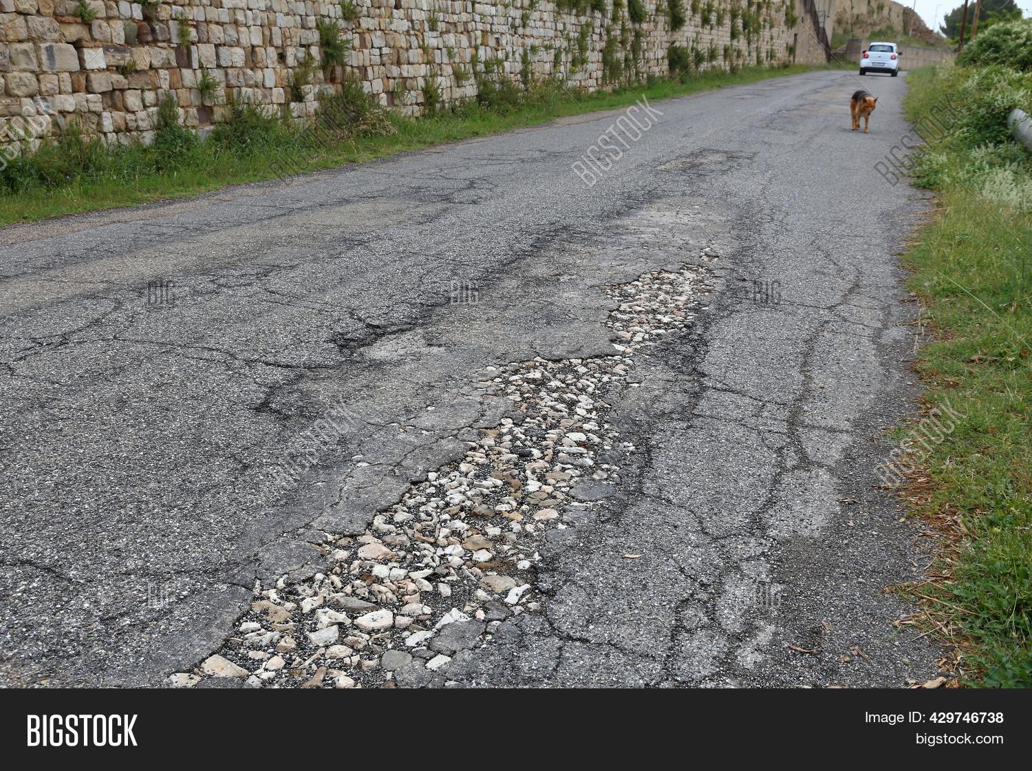 Road Surface Defects Image & Photo (Free Trial) | Bigstock