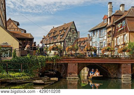Colmar, France, June 27, 2021 : Cruise On The Lauch River. Petite Venise Is A Picturesque Tourist Ar
