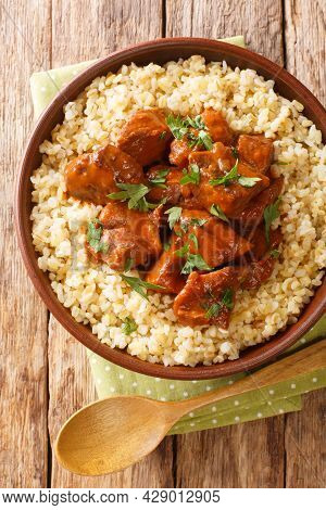 Afelia Is A Traditional Cypriot Dish Of Small Pieces Of Fried Pork Meat Cooked In Red Dry Wine And C