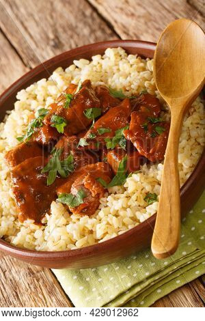 Afelia Is A Traditional Cypriot Dish Of Small Pieces Of Fried Pork Meat Cooked In Red Dry Wine And C