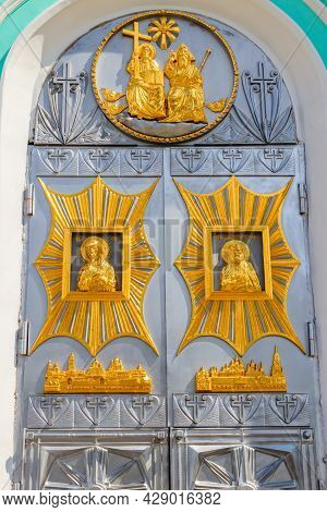 Close-up Of Entrance Door Decorated With Gilded Icons In Trinity Cathedral Of Holy Trinity-saint Ser