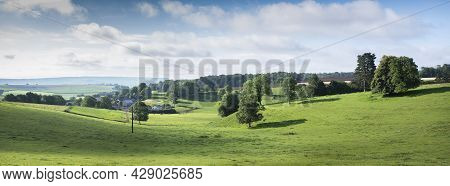 Rural Countryside Landscape With Green Meadows And Village In French Ardennes Near Charleville Under