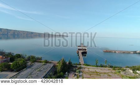 Abandoned Coastal Village. Shot. Top View Of Abandoned Fishing Village On Coast Of Blue Sea. Abandon