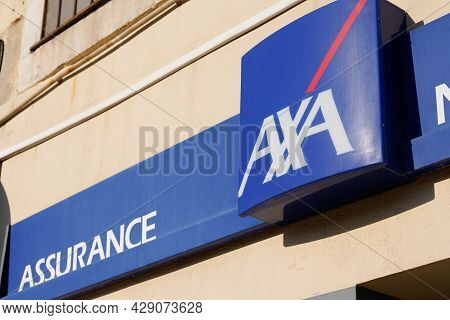 Perpignan , Occitanie France  - 06 25 2021 : Axa Logo Text In Office Wall Building With Sign Brand O