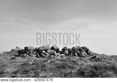 The Exposed Stones At The Top Of A Cairn Known As The Millers Grave On Midgley Moor In Calderdale We