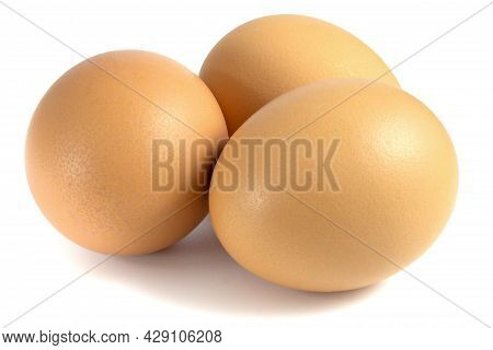 Three Chicken Eggs Isolated On White Background