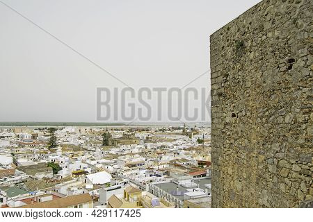 Views From Above Of The Castle Of The Town Of Sanlucar De Barrameda With A Tower On The Side, Cadiz,