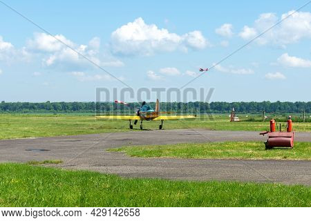 Gorodok. Ukraine. June 6, 2021. Tsuniv Airfield. Training Aircraft, Taxiing To The Runway. Sport Ext