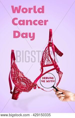 World Cancer Day. Pink Lace Bra On A Lilac Background And A Woman's Hand With A Magnifying Glass. Ve