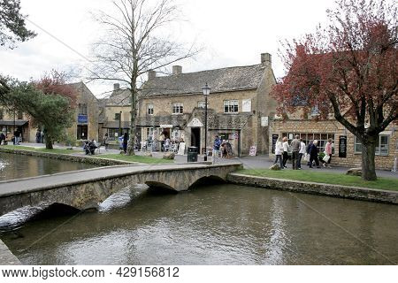 Views Of Local Shops And The River Windrush At Bourton On The Water In Gloucestershire, Uk, Taken 10