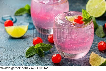 Cherry Limeade Or Lemonade In Drinking Glass. Refreshing Summer Drink.