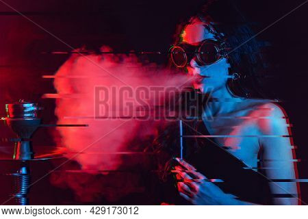 Hookah Atmosphere. The Girl Enjoys Smoking A Hookah, Sheesha. Surrealism