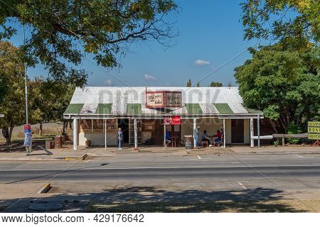 Smithfield, South Africa - April 23, 2021: A Street Scene, With The Wilgers Cafe And People, In Smit