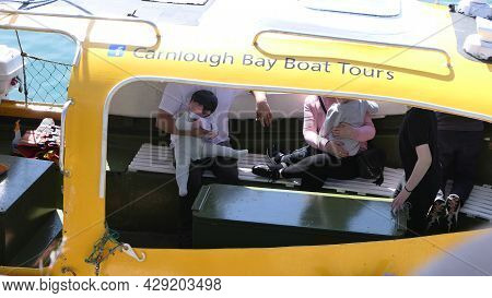Tour Boat With Passengers On The Irish Sea Carnlough Village Northern Ireland On 5th July 2021