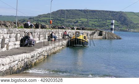 Tour Boat With Passengers On The Irish Sea Carnlough Village Northern Ireland On 5th July 2021