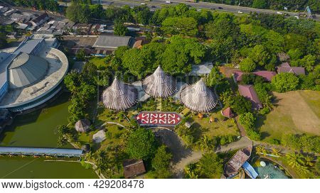 Aerial View Of Taman Mini Indonesia Indah As National Landmark In Indonesia With Noise Cloud. Jakart