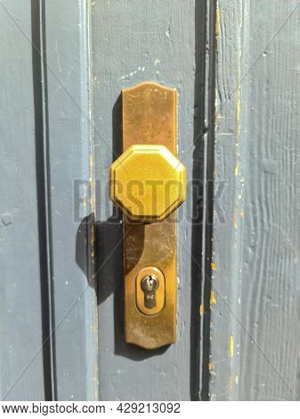 Close Up Of A Metal Lock At A Closed Door