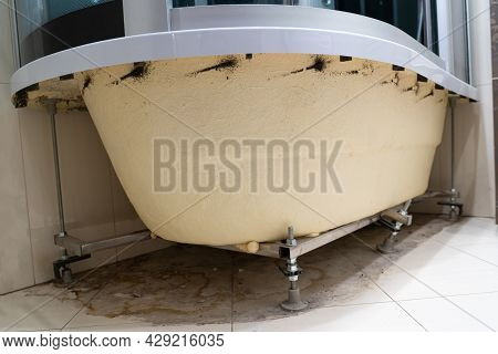 Dirty Puddle, Dirt, Hair, Dust, Mold, Bacteria, Fungus On The Floor Under The Bathroom. Inner Side O