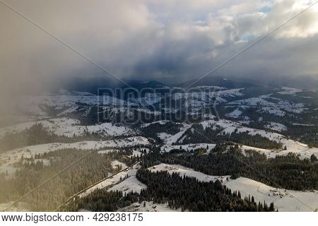 Winter Landscape With Spruse Trees Of Snow Covered Forest In Cold Mountains.