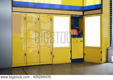 Smart Locker. Electronic Steel Parcel Locker, Automatic Mailboxes. Yellow Wall And Electrical Contro