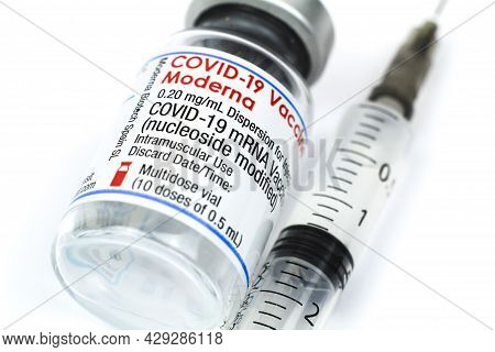 Madrid, Spain- August 6, 2021: Syringe And Vial With Moderna Covid-19 Vaccine On White Background