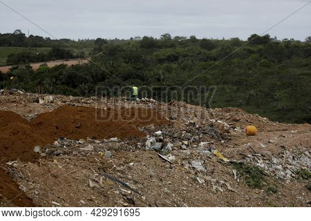 Truck Deposits Garbage In A Landfill In The City Of Salvador