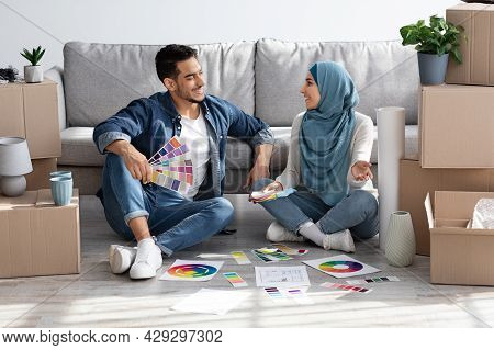 Creative Arab Family Working On Interior For Their New House