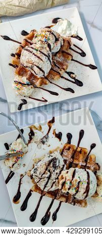 belgian waffles dessert with chocolate source and ice cream