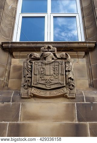 Rochdale, Greater Manchester, United Kingdom - 14 July 2021: Close Up Of The Heraldic Sign Above The