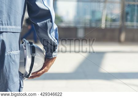 Engineer Man Hands Holding Hardhat White Work Helmet Hard Hat For Construction Engineering. Construc