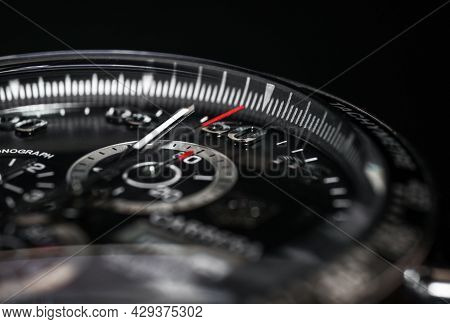 Dial Luxury Quartz Watch Chronograph On A Black Background, Close-up.