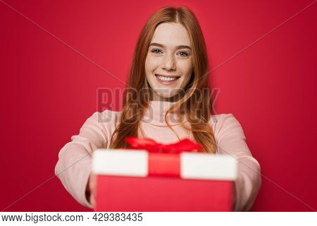Beautiful Female Person. Pretty Young Woman. Woman Giving A Present Box.