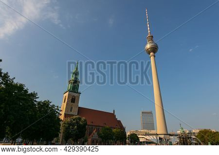 Tv Tower And St.marien Church At The City Of Berlin, Capital City Of Germany. Fernsehturm Und St. Ma