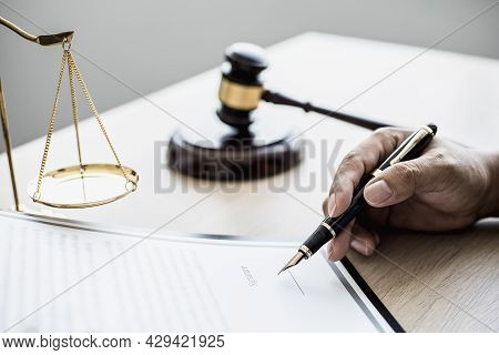 Attorney At Work, On The Table There Is A Small Hammer To Beat The Judges Table In Court. And Justic