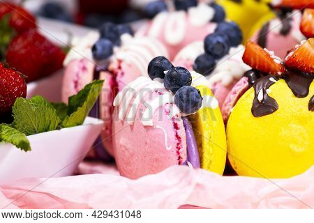 Macaroon, Handmade Beautiful Sweet Food, Dessert With Fresh Strawberries And Blueberries Decorated W