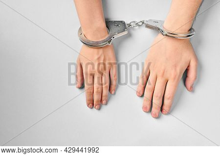Love Forever. Male And Female Hands In Handcuffs. Prenuptial Agreement, Duties Of Love Couple.