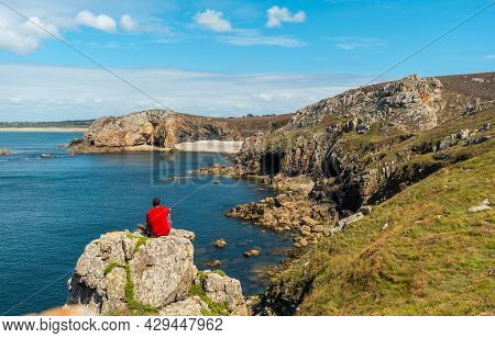 A Young Man In A Red Shirt On The Coast Enjoying The Summer At Le Chateau De Dinan On The Crozon Pen