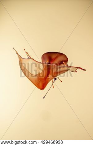 An Orange Splash On Yellow Background To Layer, Composite And Blend With Your Own Product Images To 