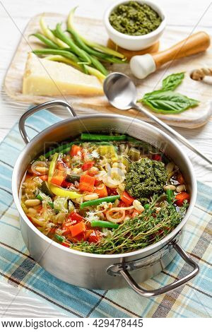 Vegetarian Summer Soupe Au Pistou, French Vegetable Bean Soup With Sauce Pesto And Herbs In A Metal 