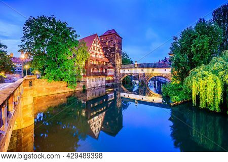 Nuremberg, Germany. The Wine Warehouse (weinstadel) On The Banks Of The Pegnitz River.
