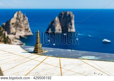 Capri, Italy - August 24 2020: Tiny Sundial Construction On The Edge Of Cliff At Giardini Di Augusto