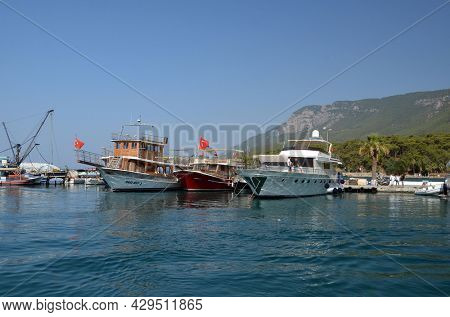 Boats and yachts at the in the marina of village  Akyaka - slow city in Turkey.August 1,2021. Mugla,Turkey