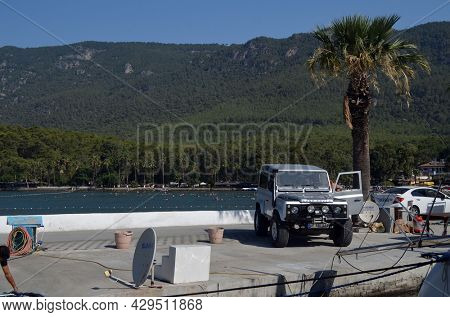 Boats and yachts at the in the marina of village  Akyaka - slow city in Turkey.August 1,2021. Mugla,Turkey