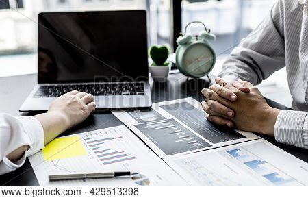 Two Businessmen Are Working Together In Business Consultation, And They Are Planning Their Growth An