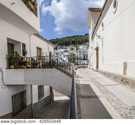 Crossroads Of Streets In Murtas At Different Levels With Access To A Bridge-type House With Balconie