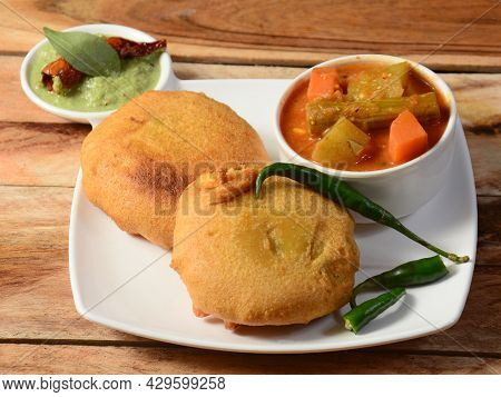 Batata Vada Or Potato Fritter Is A Popular Snack In Maharashtra,india. Mashed Potato Patty Coated Wi