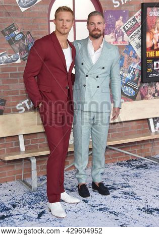 LOS ANGELES - AUG 08: Alexander Ludwig and Stephen Amell arrives for the STARZ 'Heels' Los Angeles Premiere on August 08, 2021 in Los Angeles, CA
